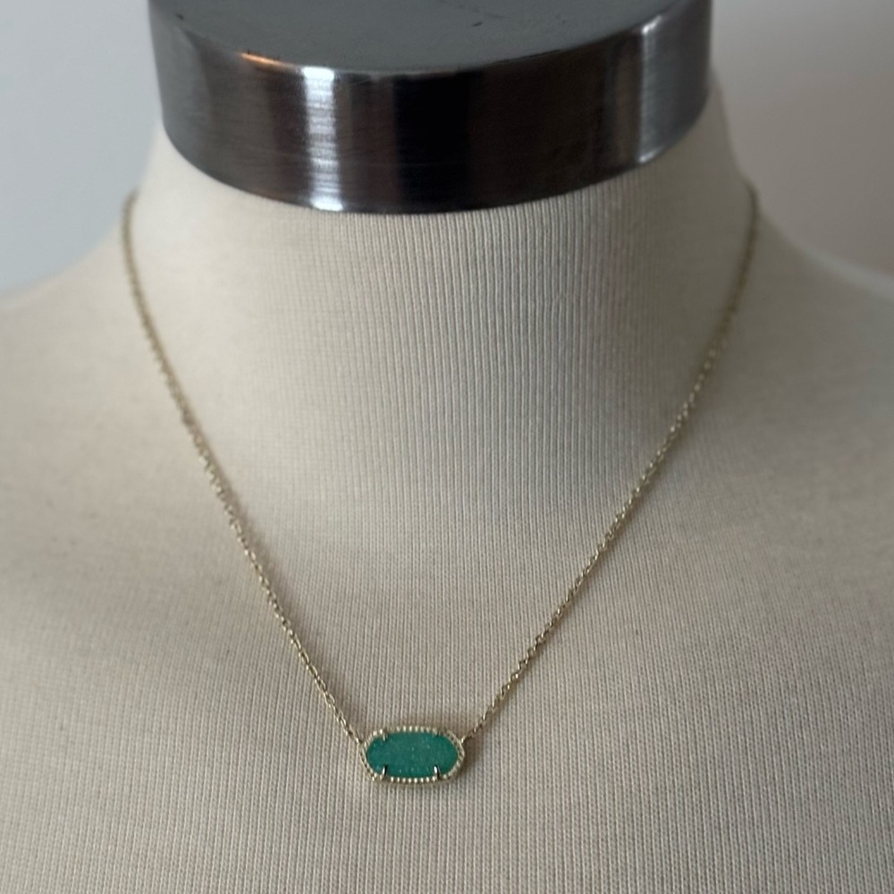Kendra Scott Gold Necklace with Pale Blue-Green Stone. 15” to 17” Chain.